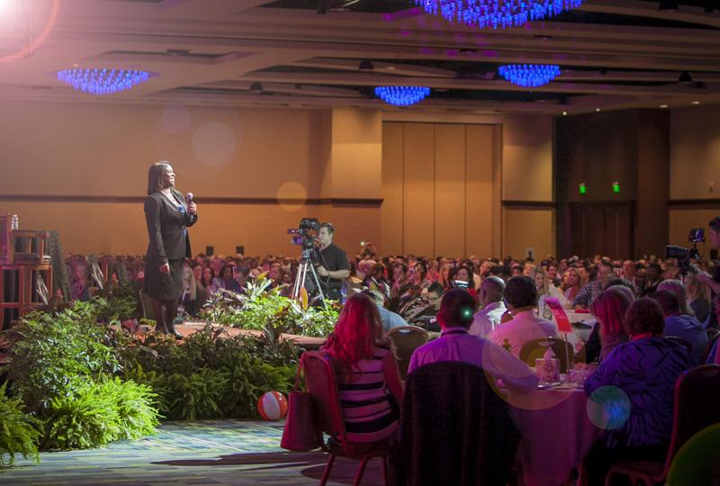 Shelia speaking at an event